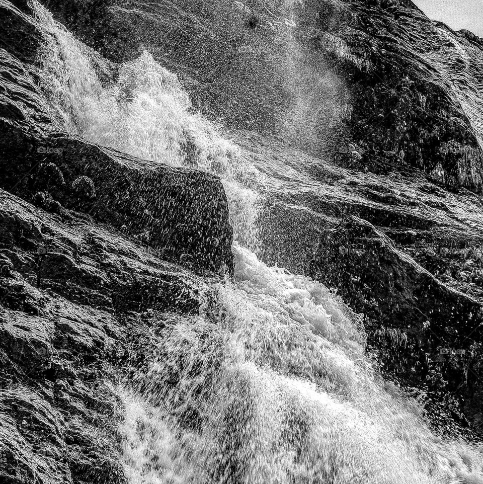 Close up of stunning waterfall in Glencoe.