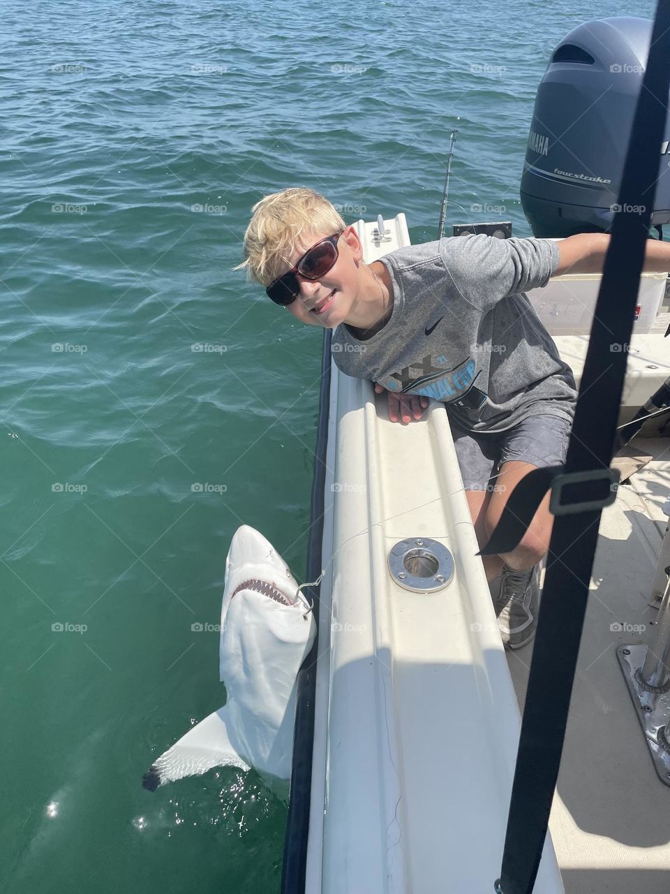 This is Tripp fishing for FISH, not a baby shark but he caught one in Galveston TX. And of course we let it go 🤍