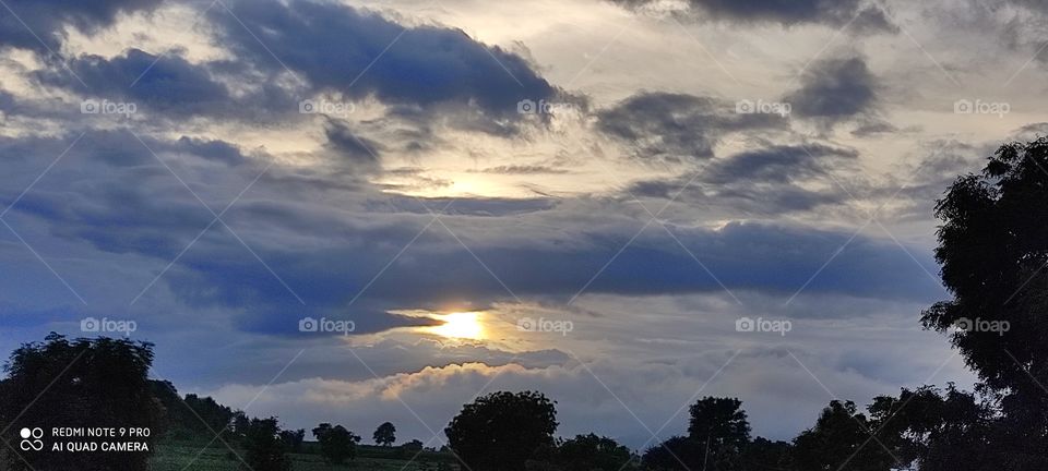 The setting sun looks very beautiful on rainy days