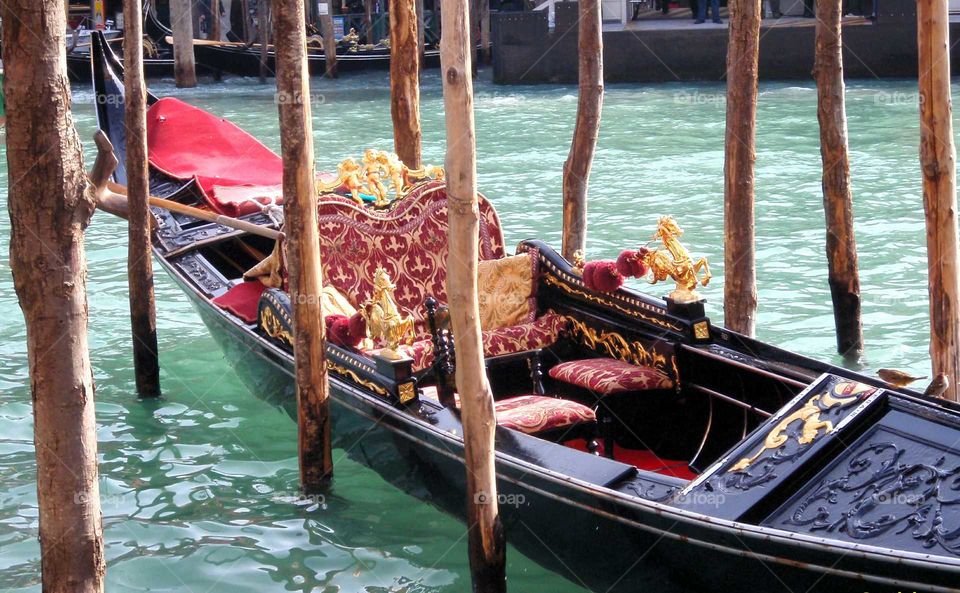 a Venetian gondola at the margin of the Grand canal