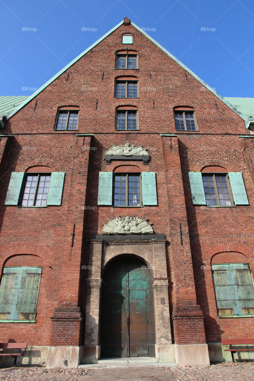 Symmetrical old brick building 