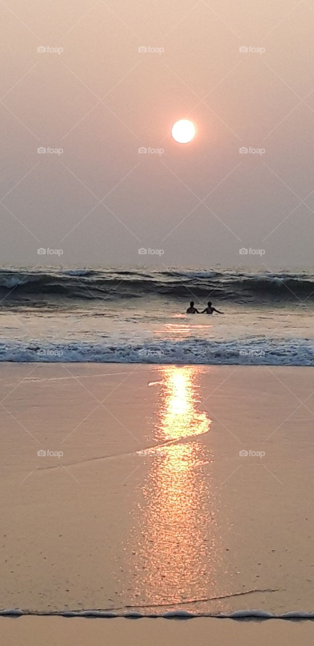 Sunset bath in Leela Goa