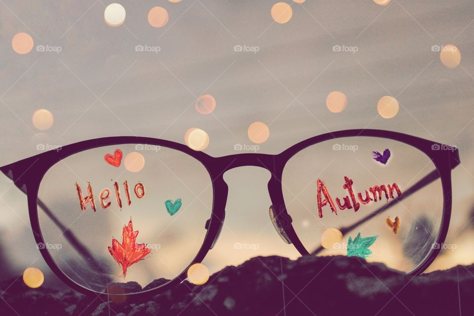hello autumn written in glasses