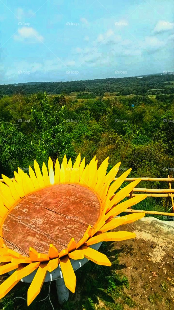 Artificial sunflower above the elevation area