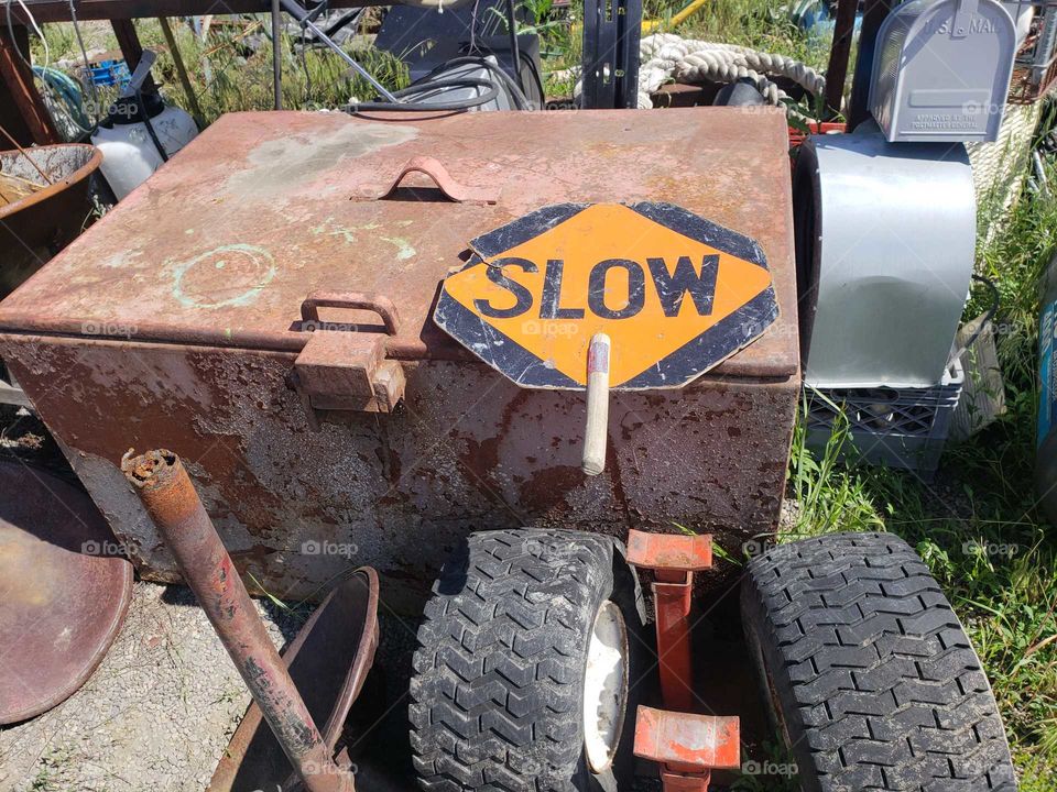 old retired farm equipment taking it easy.