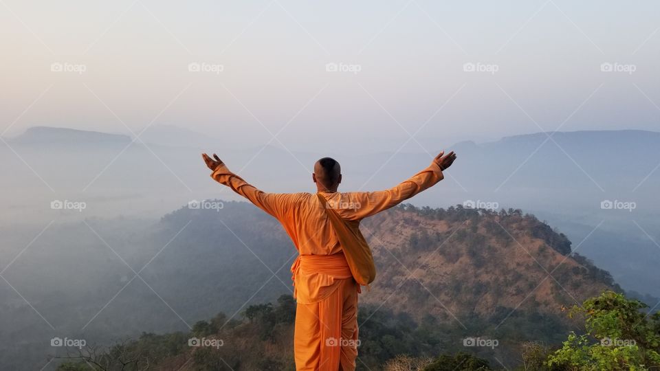 Indian monk mountain top scenery 