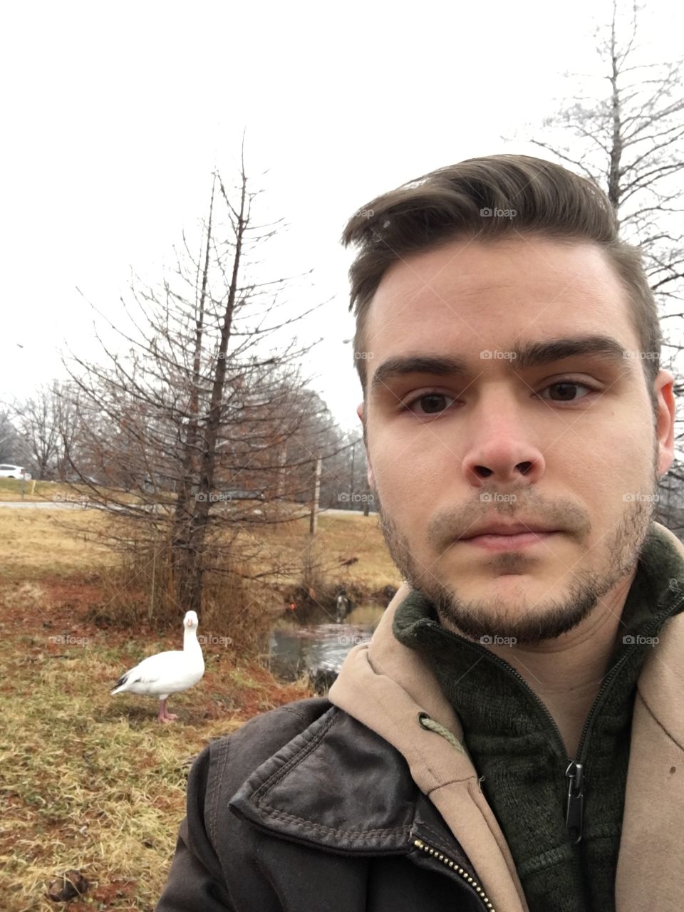 Man and duck selfie.