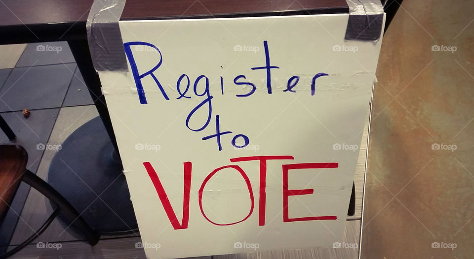 register to vote sign