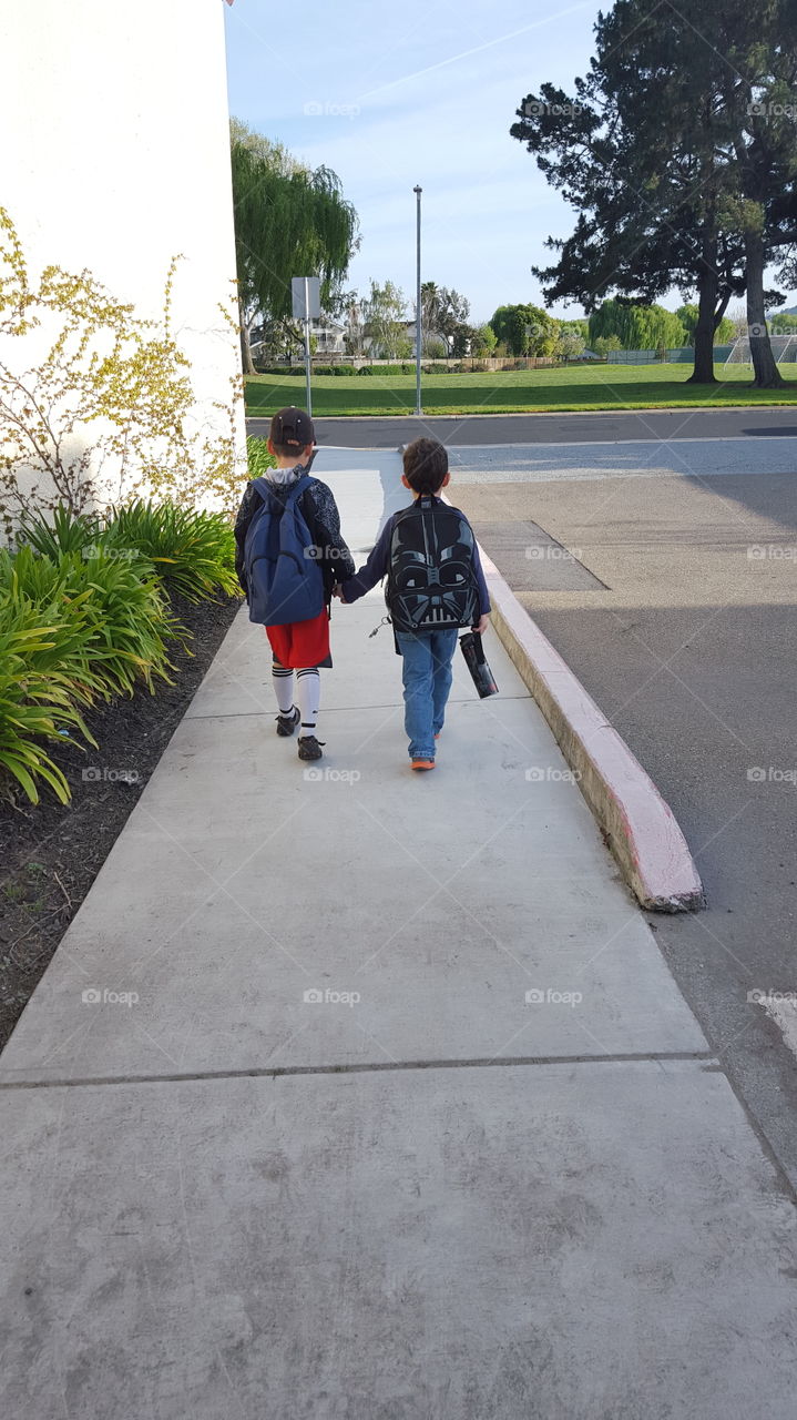 boys walking to school
