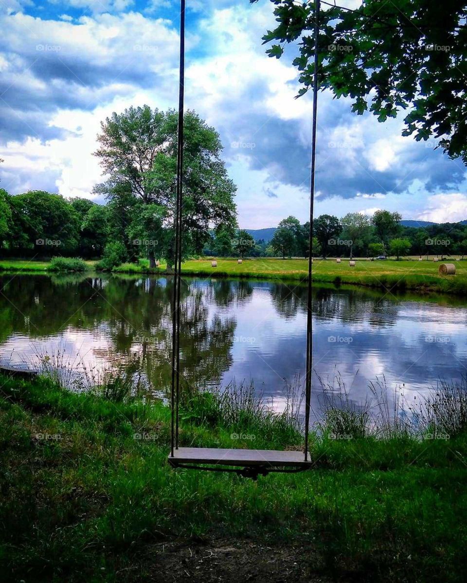lake view with the swing