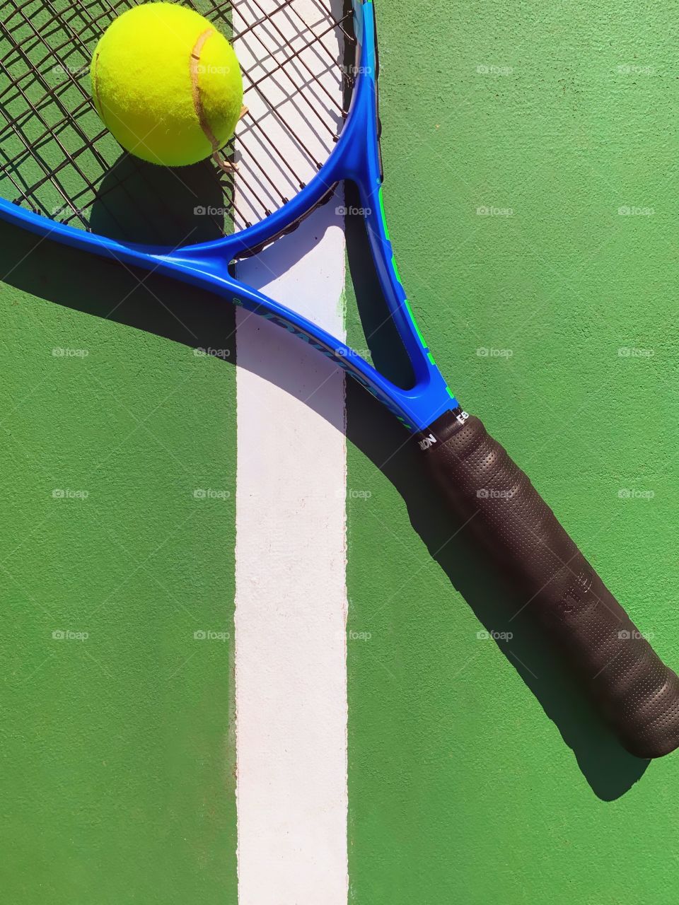 Tennis racket and ball