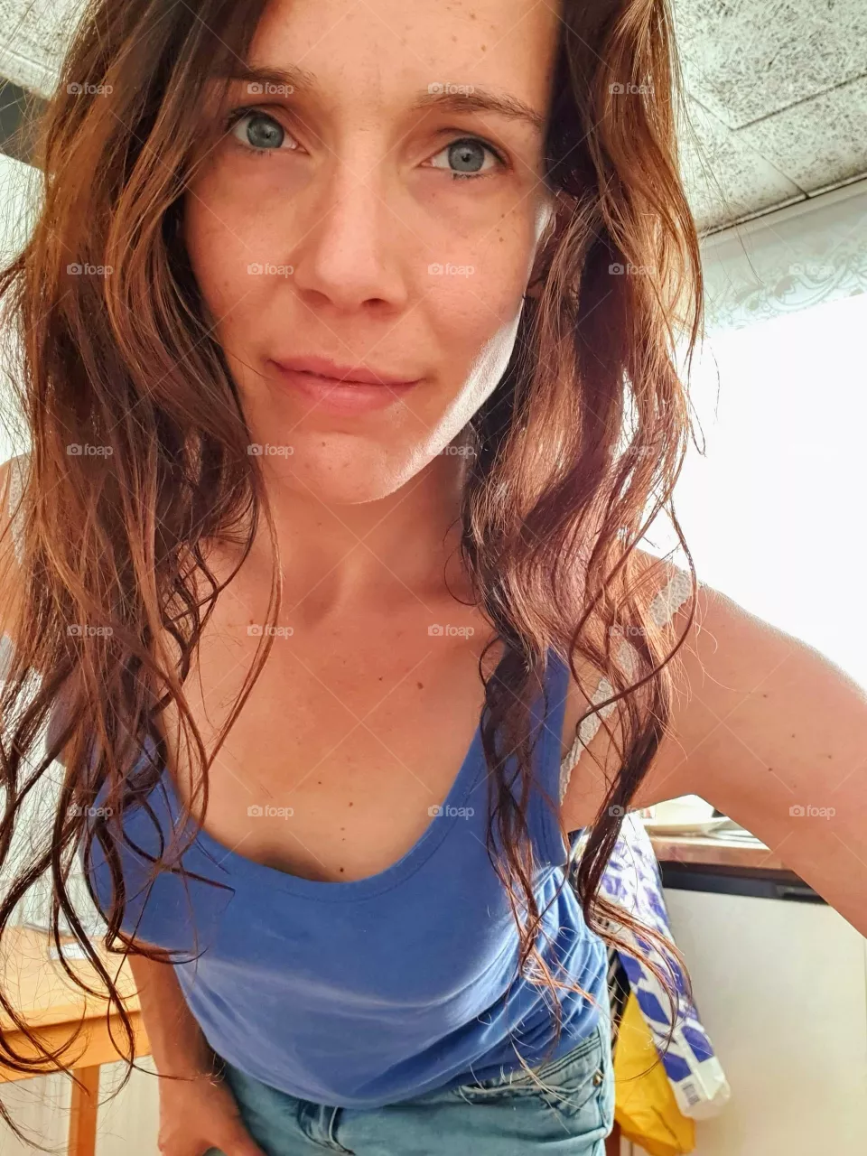 A woman looking straight into the camera for a photo