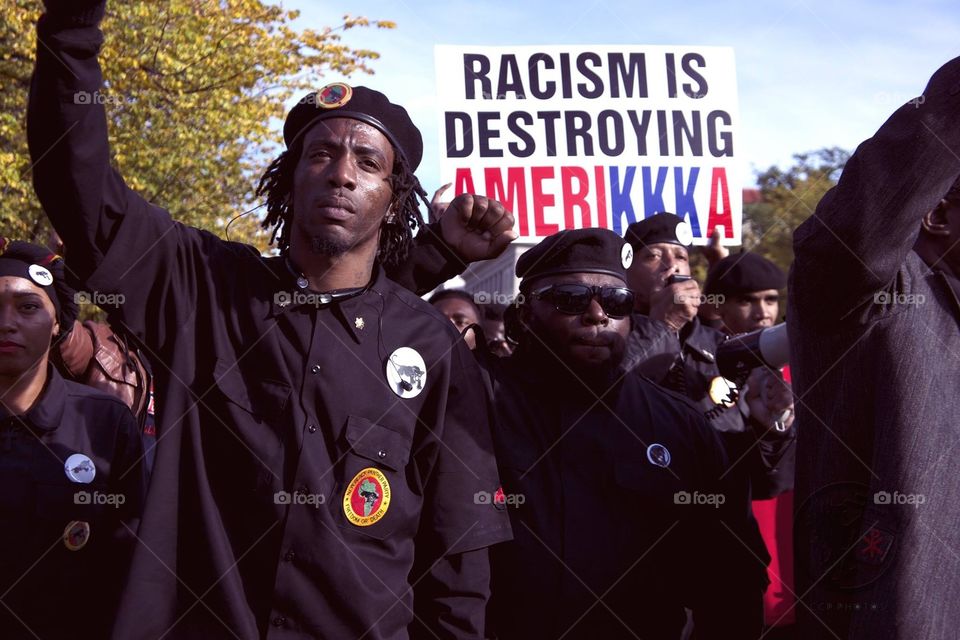 Racism Protestors with placard