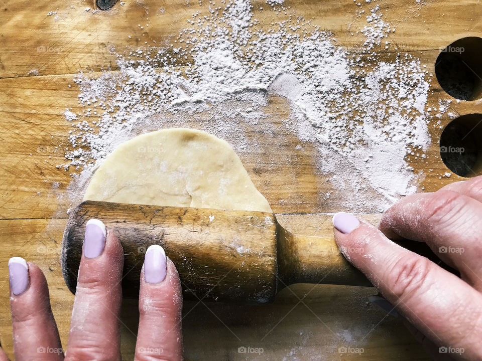 Cooking from dough on rustic wooden table 