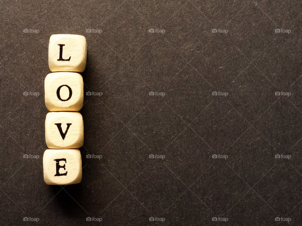 Love word on brown background