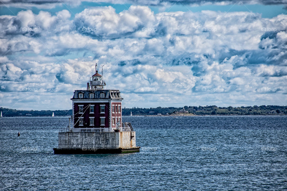 New London Ledge Lighthouse sitting on the Long Island Sound amongst a beautiful cloudy sky!