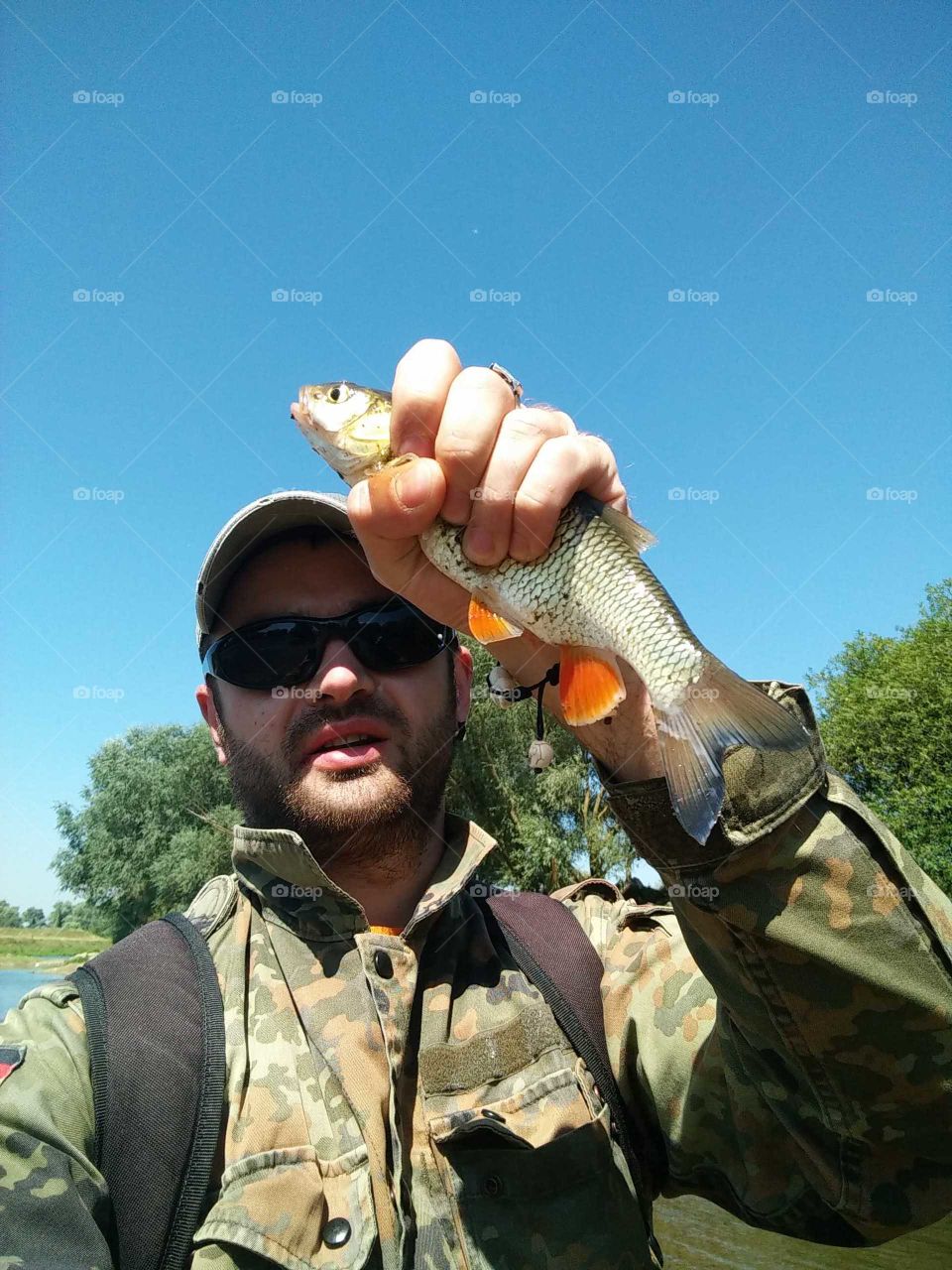 fisherman with fish