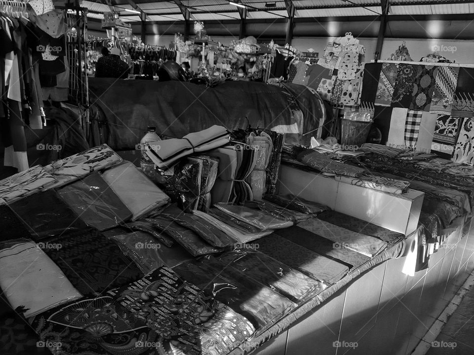 a fine art style of textile product sold in a traditional market in Sanur