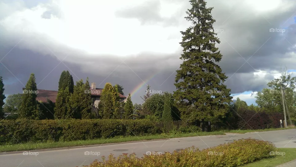 rainbow in the dark sky