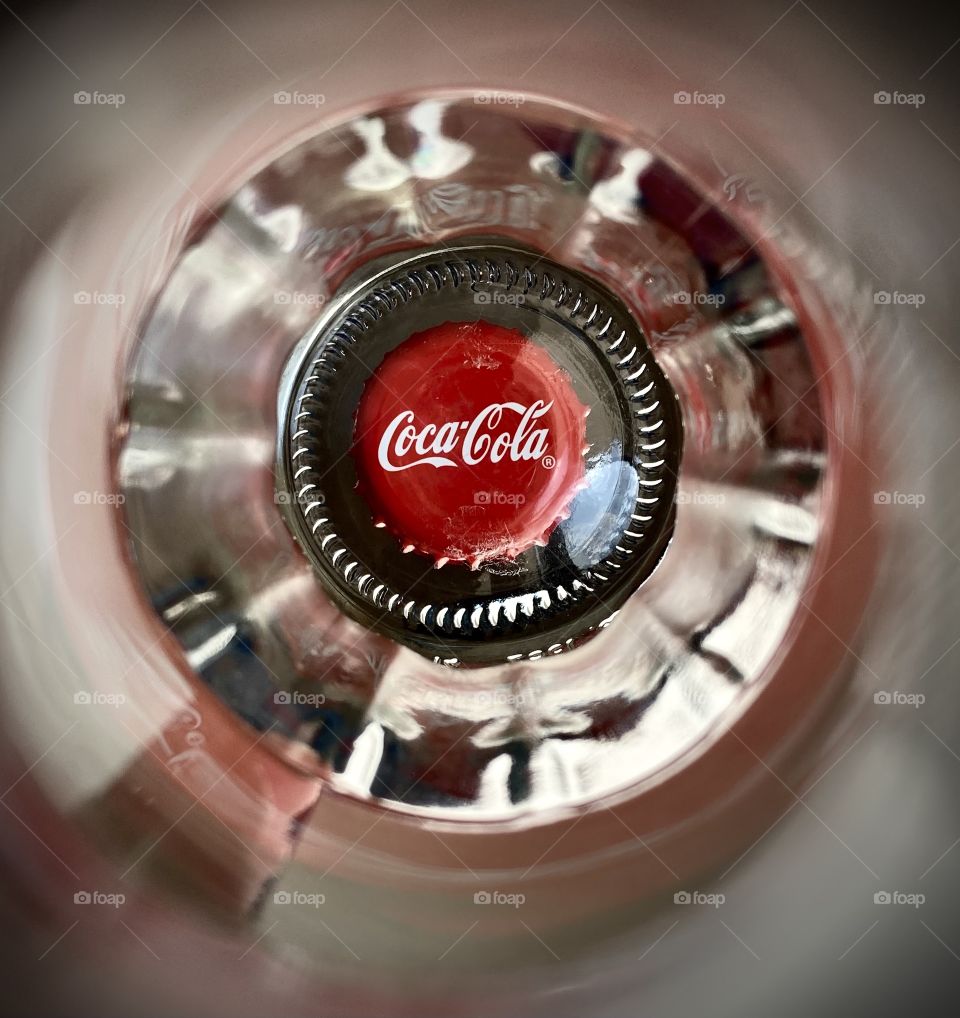  Coca-cola’s cap at the bottom of the bottle