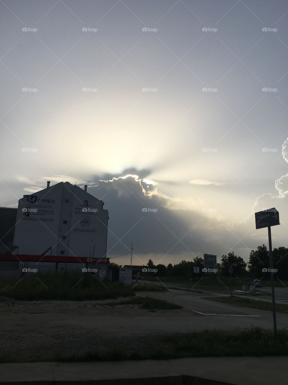 The sun is playing with the clouds