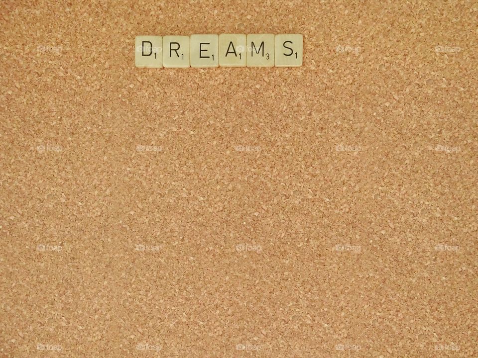 Word on corkboard background