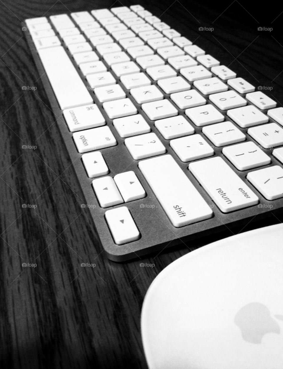Keyboard and Mouse to MAC Apple Computer. B&W photo   Apple Keyboard & Mouse Wireless   MAC Apple Desktop Computer   Way of the Future   Wooden Desk