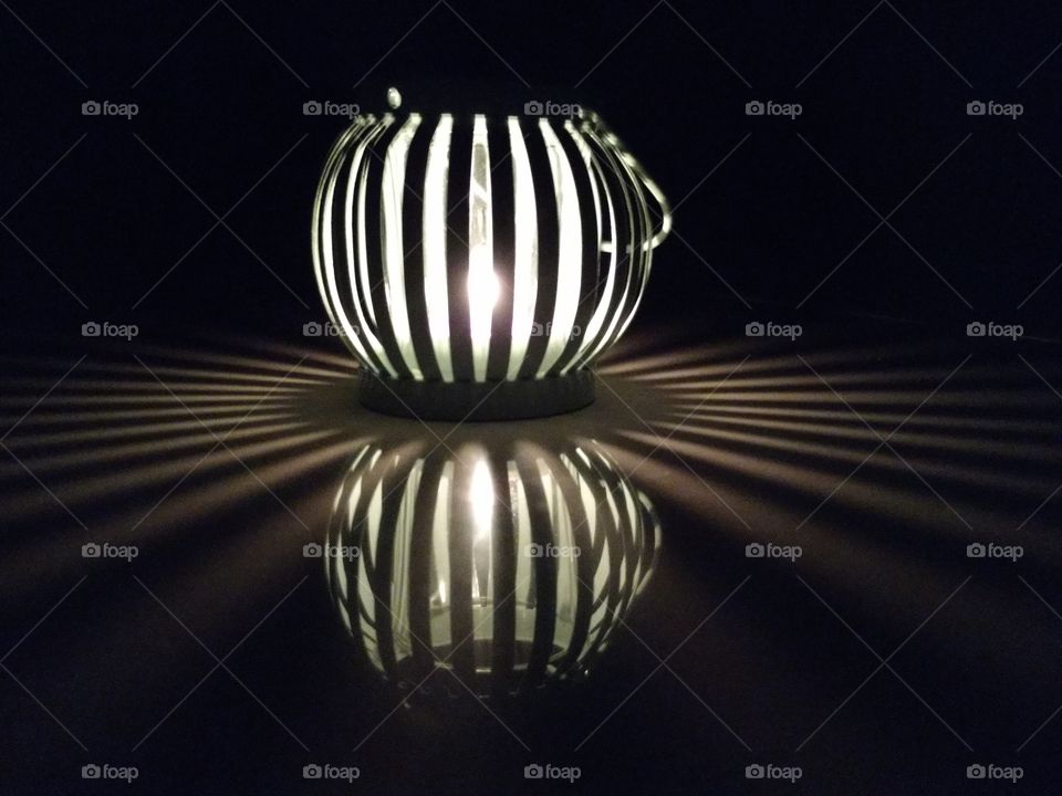 Lamp reflection on land