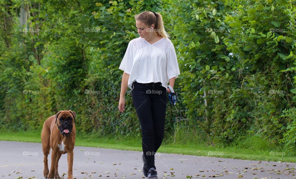 Girl Walking Her Dog