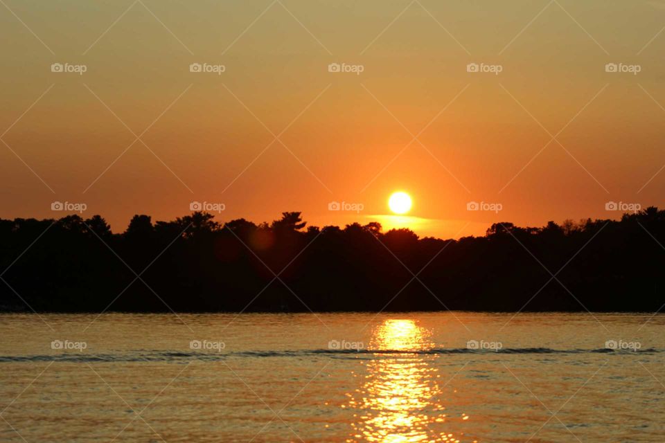 View of calm lake at dusk
