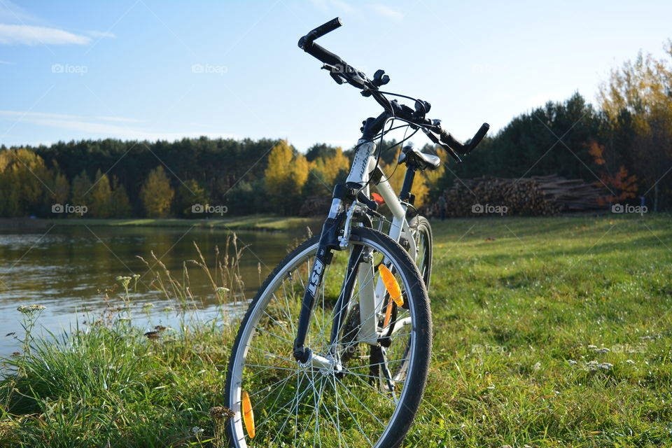 bike on a lake shore beautiful autumn landscape