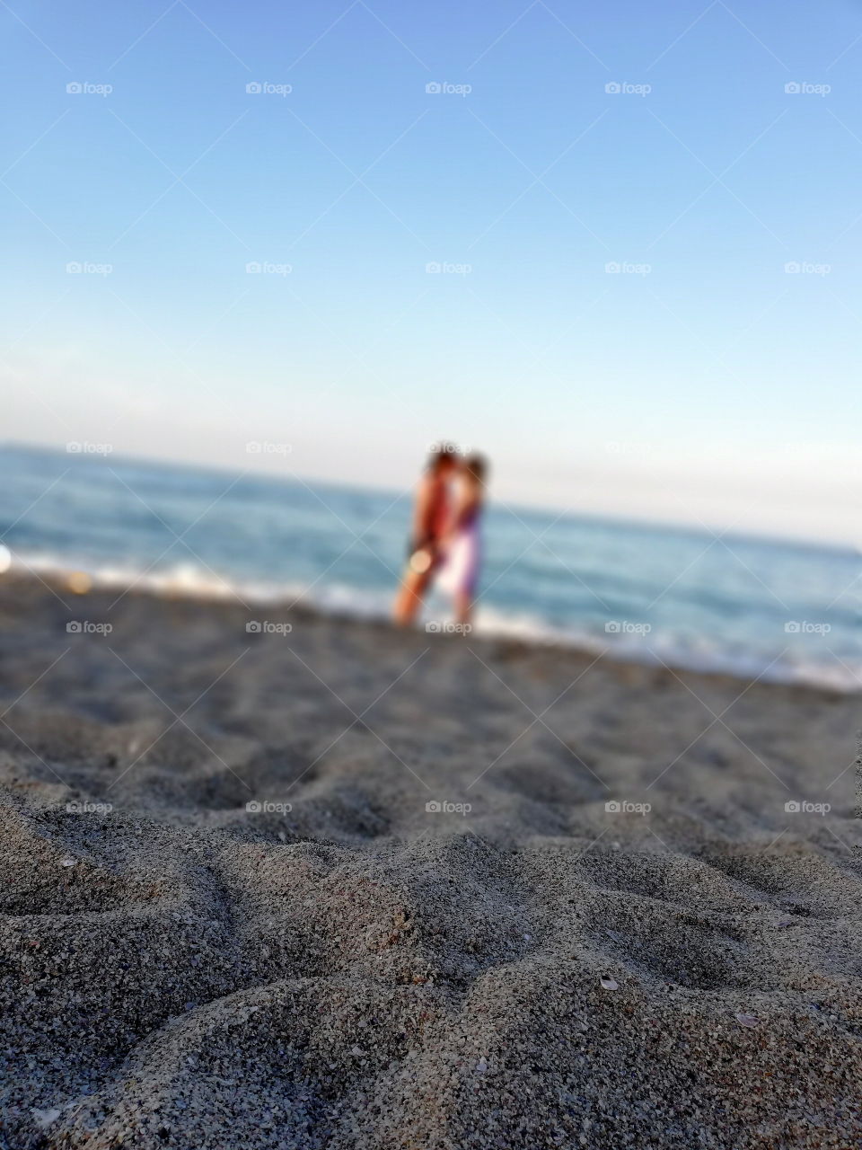 A kiss on the sand with the smell of the sea