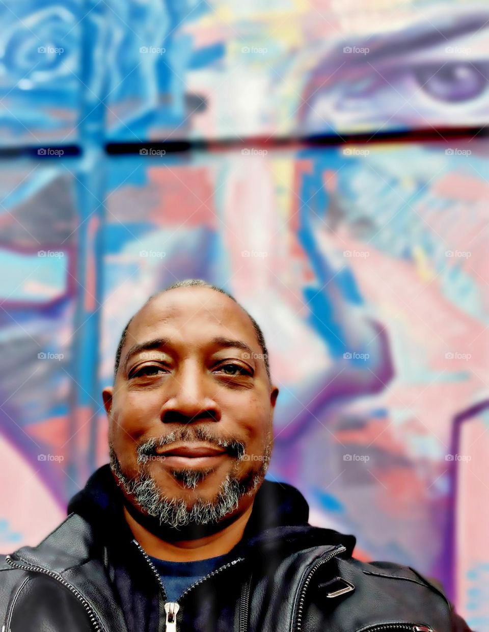 selfie pic of a man with a salt and pepper beard