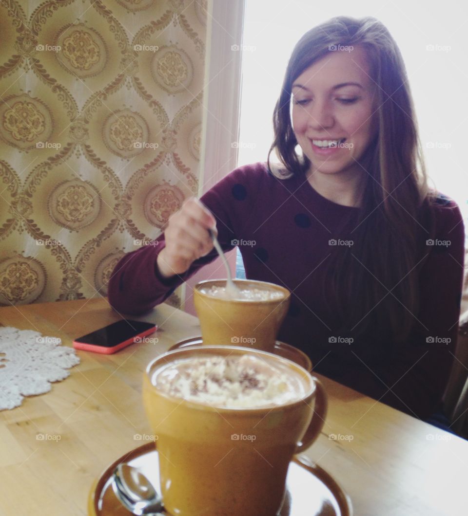 Young woman with hot coffee