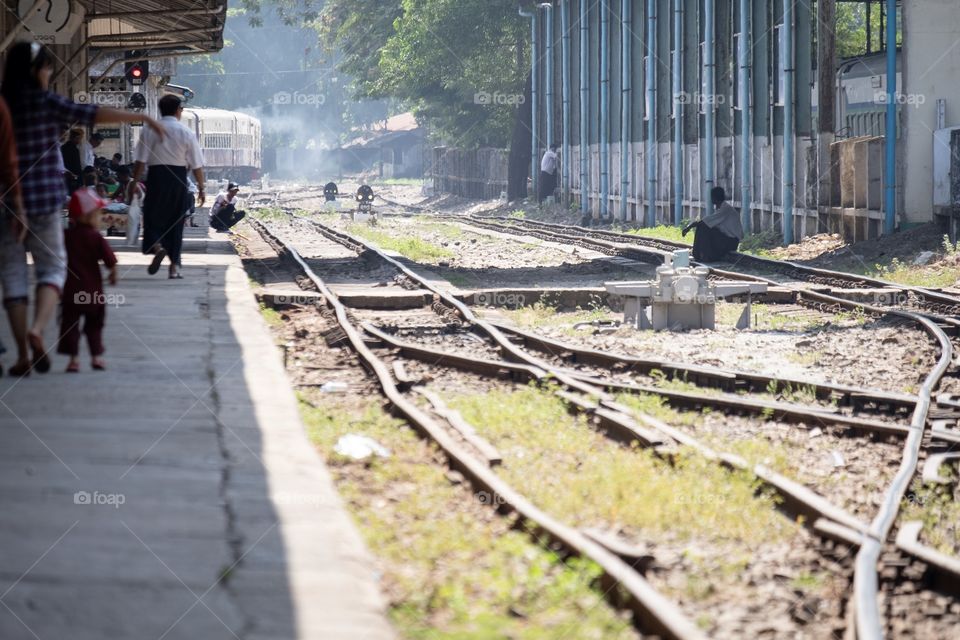 Rangoon/Myanmar-April 14 2019:People’re waiting train at central platform in Myanmar New Year 