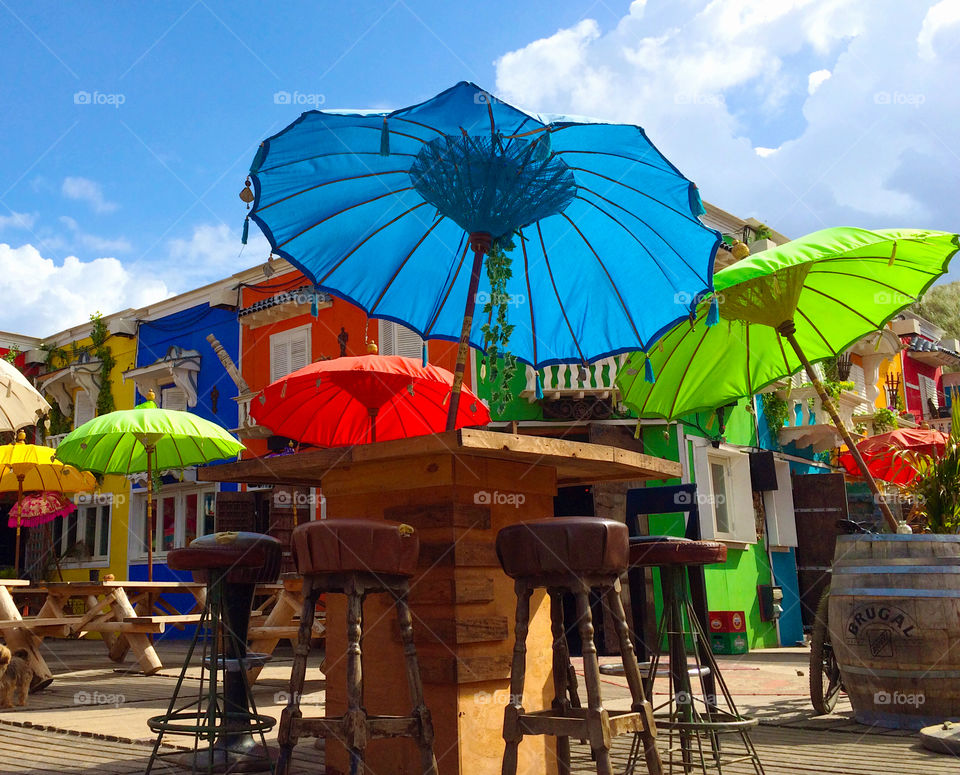 Colorful umbrellas at the beach bar. 