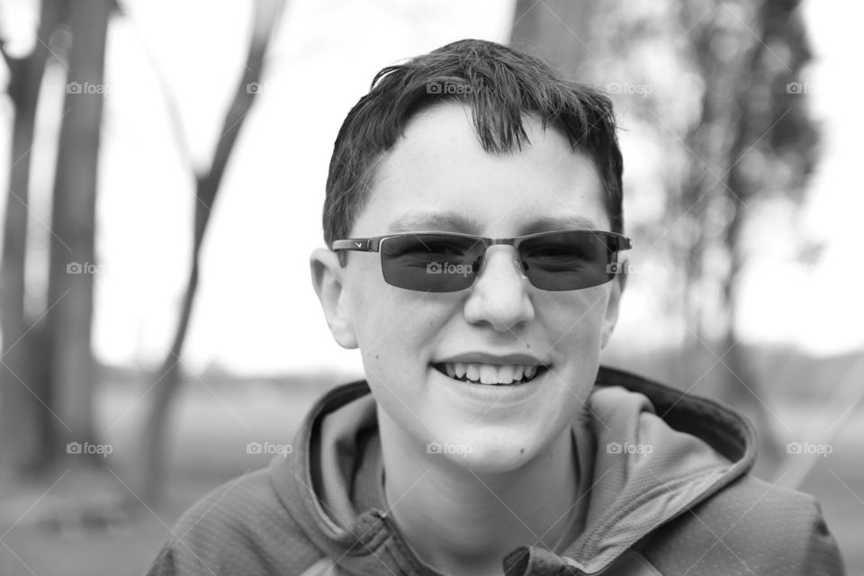 Young man b&w portrait in the park