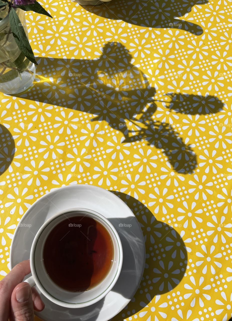 a cup of tea and shadows