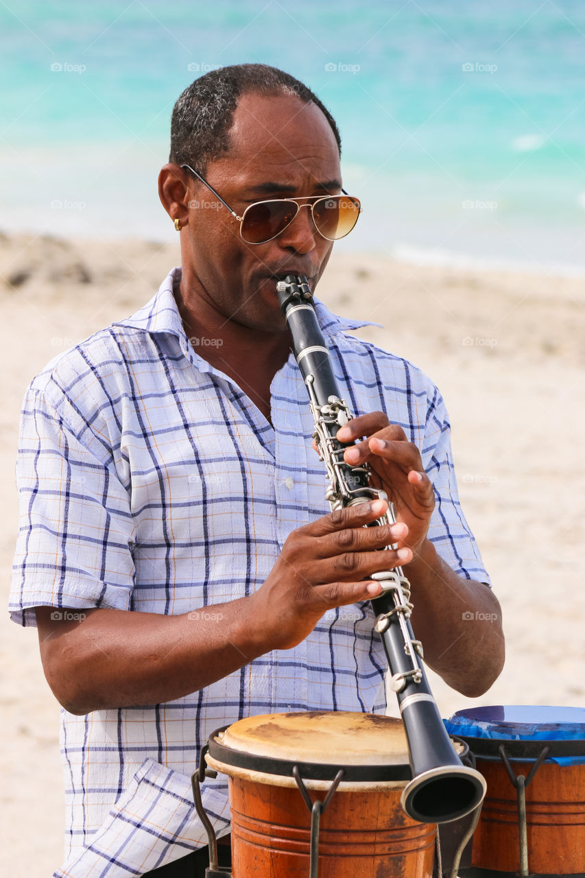 The musician plays the clarinet, Cuba, Varadero