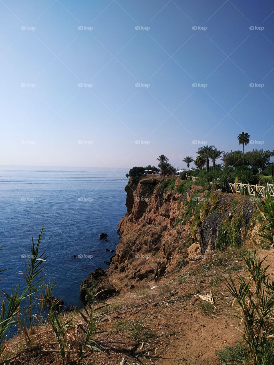 A beautiful seashore with some sort of cliff, nice nature and beautiful sea.