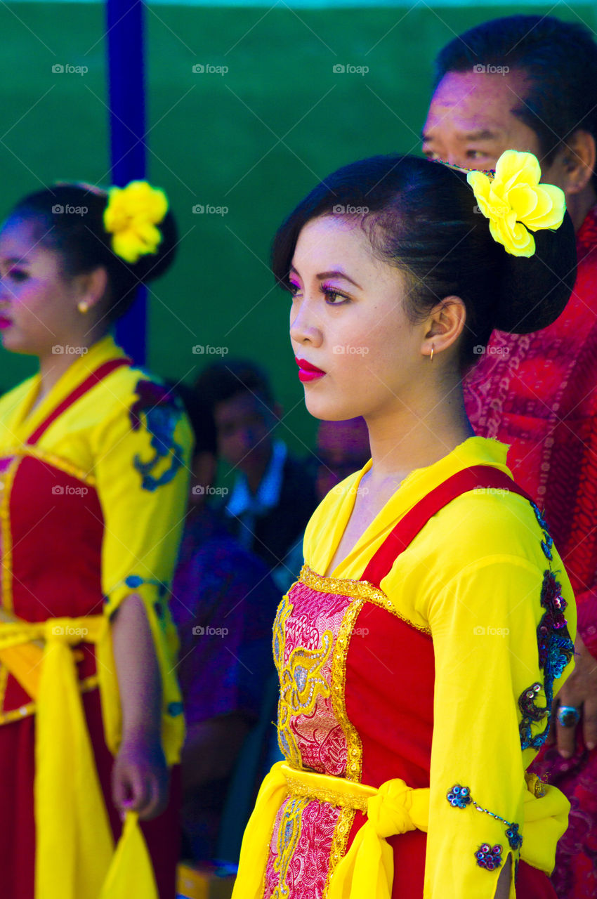 Close-up of a woman in traditional costume