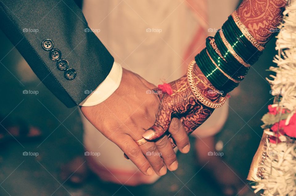 marriage holding hands