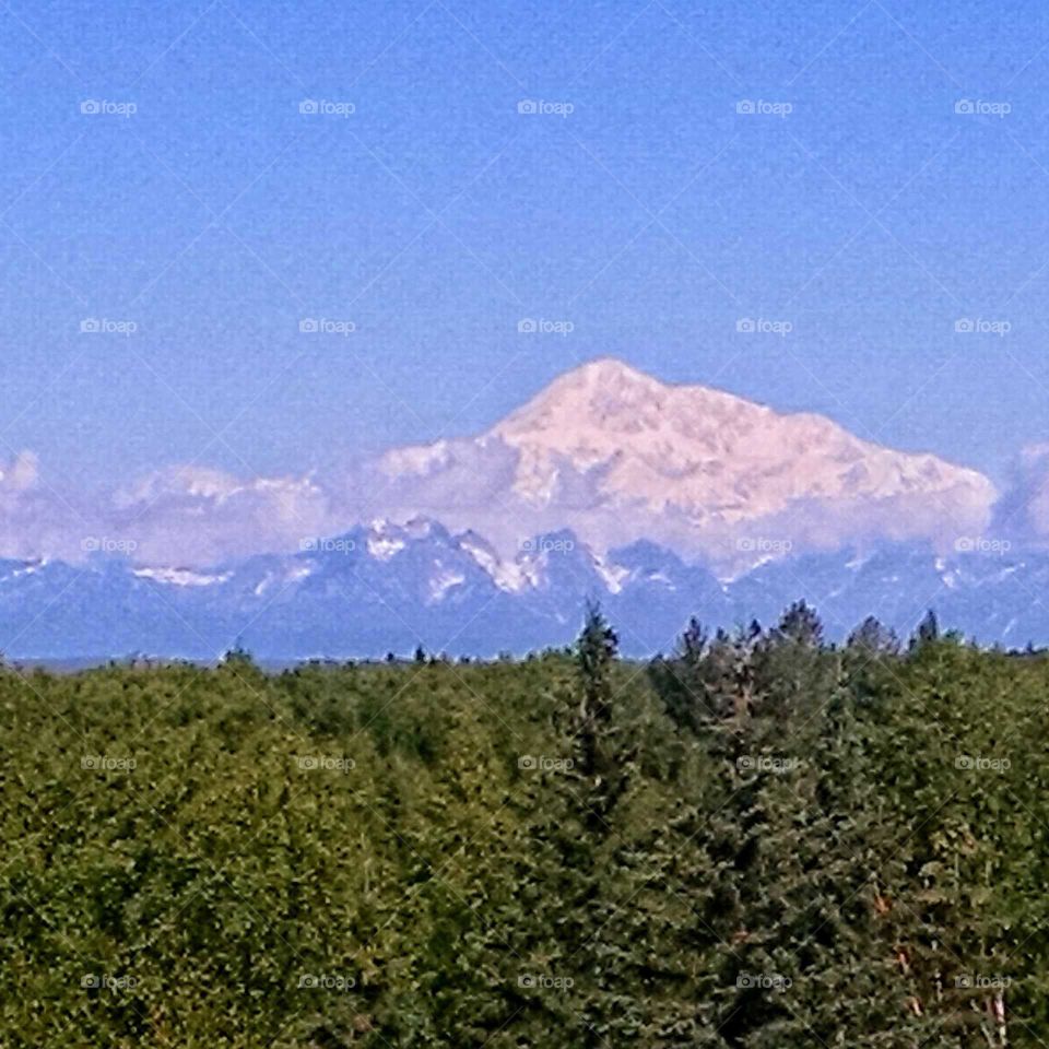 Mountains in the clouds. My
 Denali, Alaska