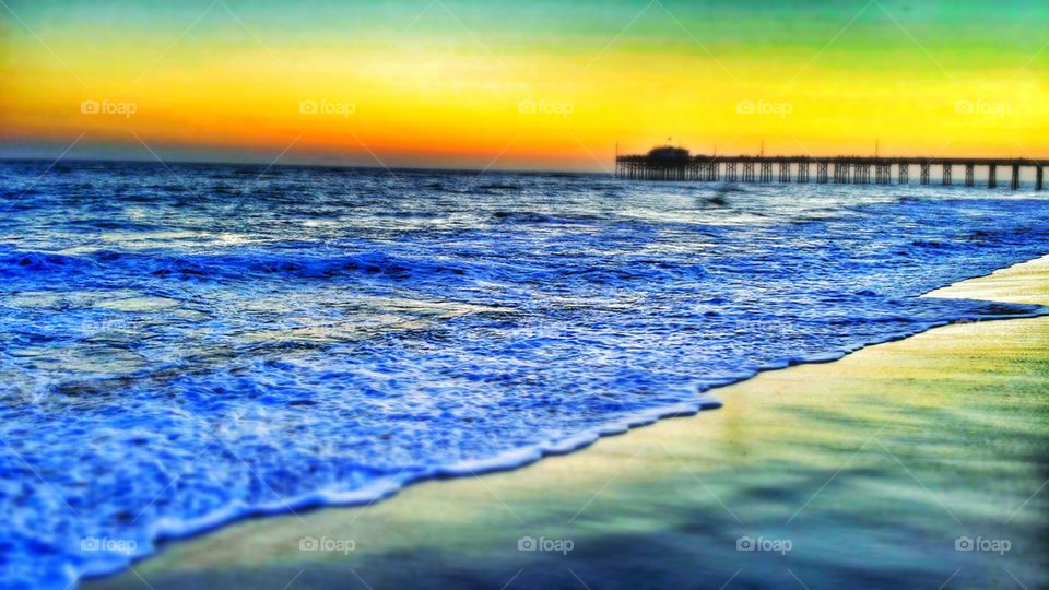 Sunset Behind Beach Pier