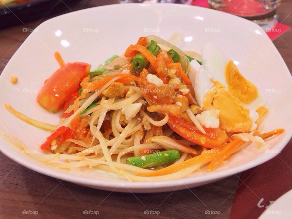 Papaya salad with salty egg