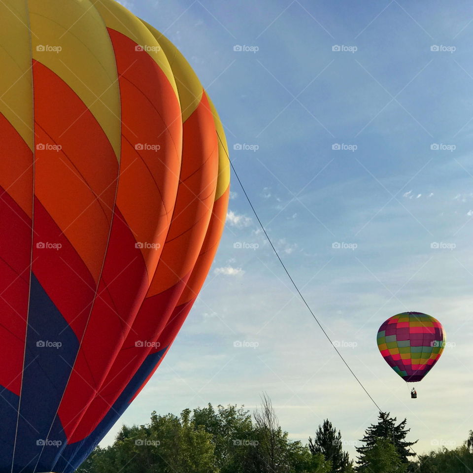 Colorful hot-air-balloons at a summer festival in Prineville in Central Oregon on a summer morning 