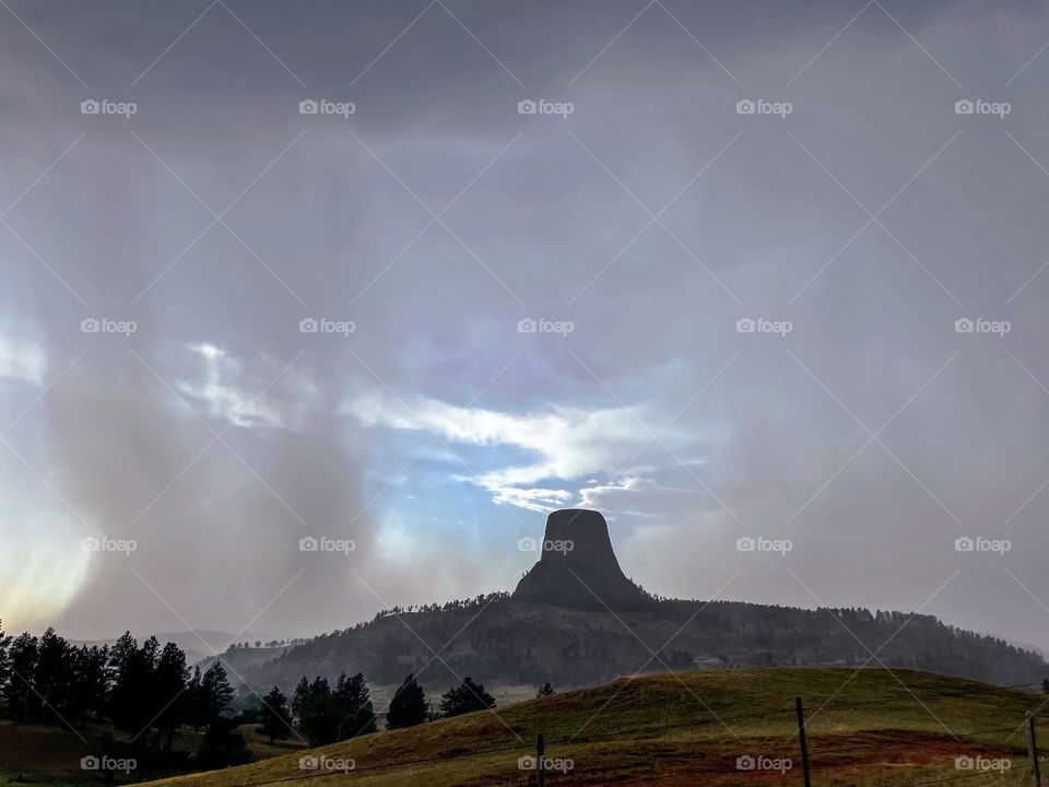 Devils tower rain storm rainfall mirror reflection mountains scenic outdoors nature stormy drops waterdrops raindrops droplets drops views water splash splashes bubbles spots rainy cloudy glass Adventure exploring landscape