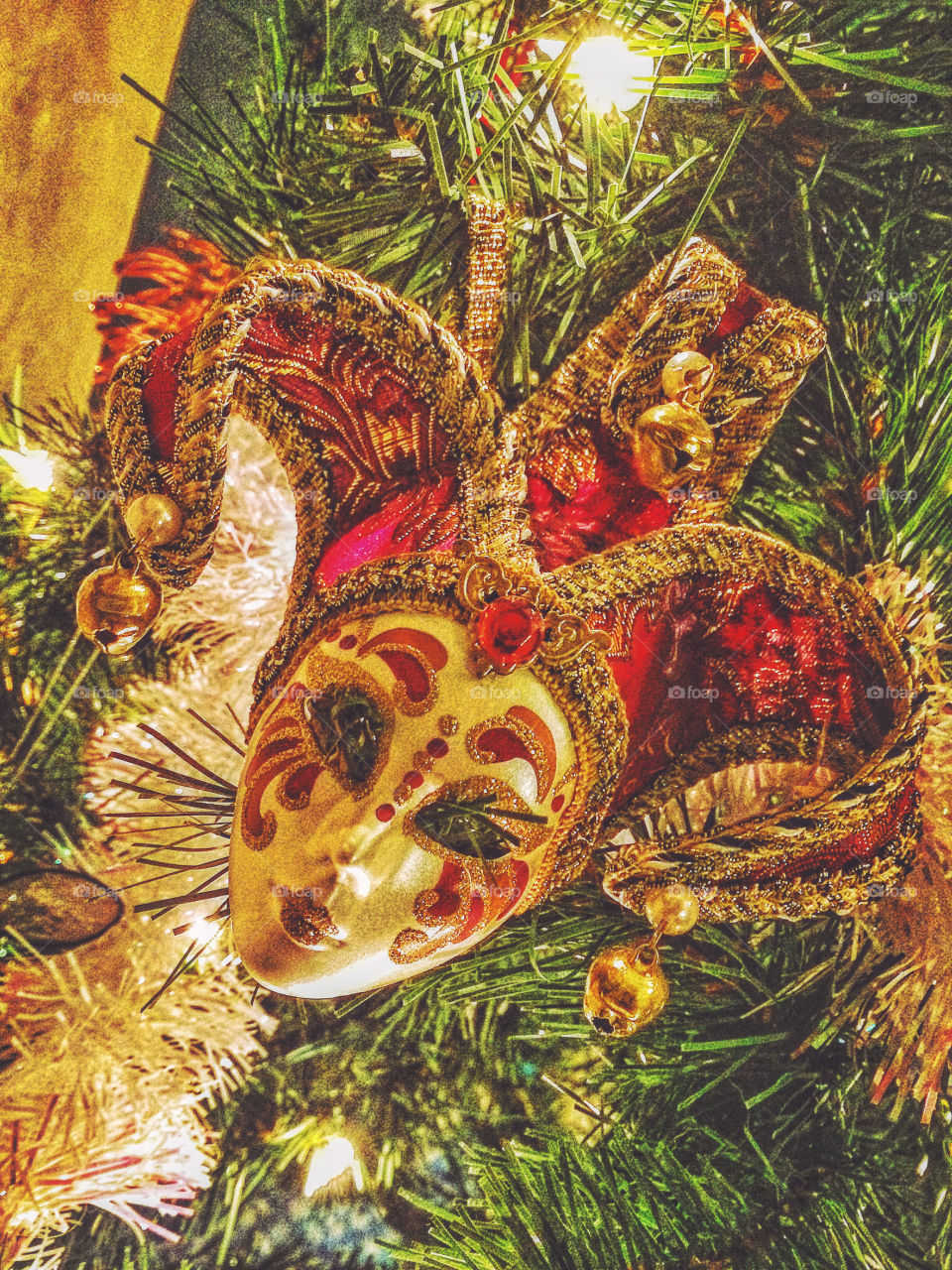 Low angle view of mask on christmas tree