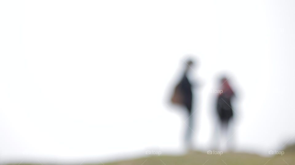 Blurry abstract background with two people