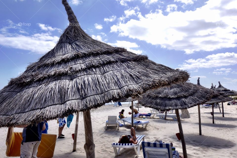 Samara Beach. Gather for shade on the beach 